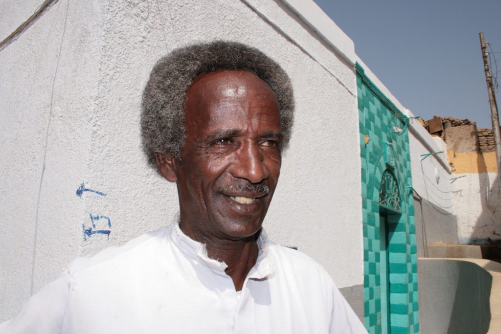 This guy = not a tout, actually (I didn't take any pictures of touts). He was a super friendly Nubian prince who gave us a tour of his village. Amazing guy! 