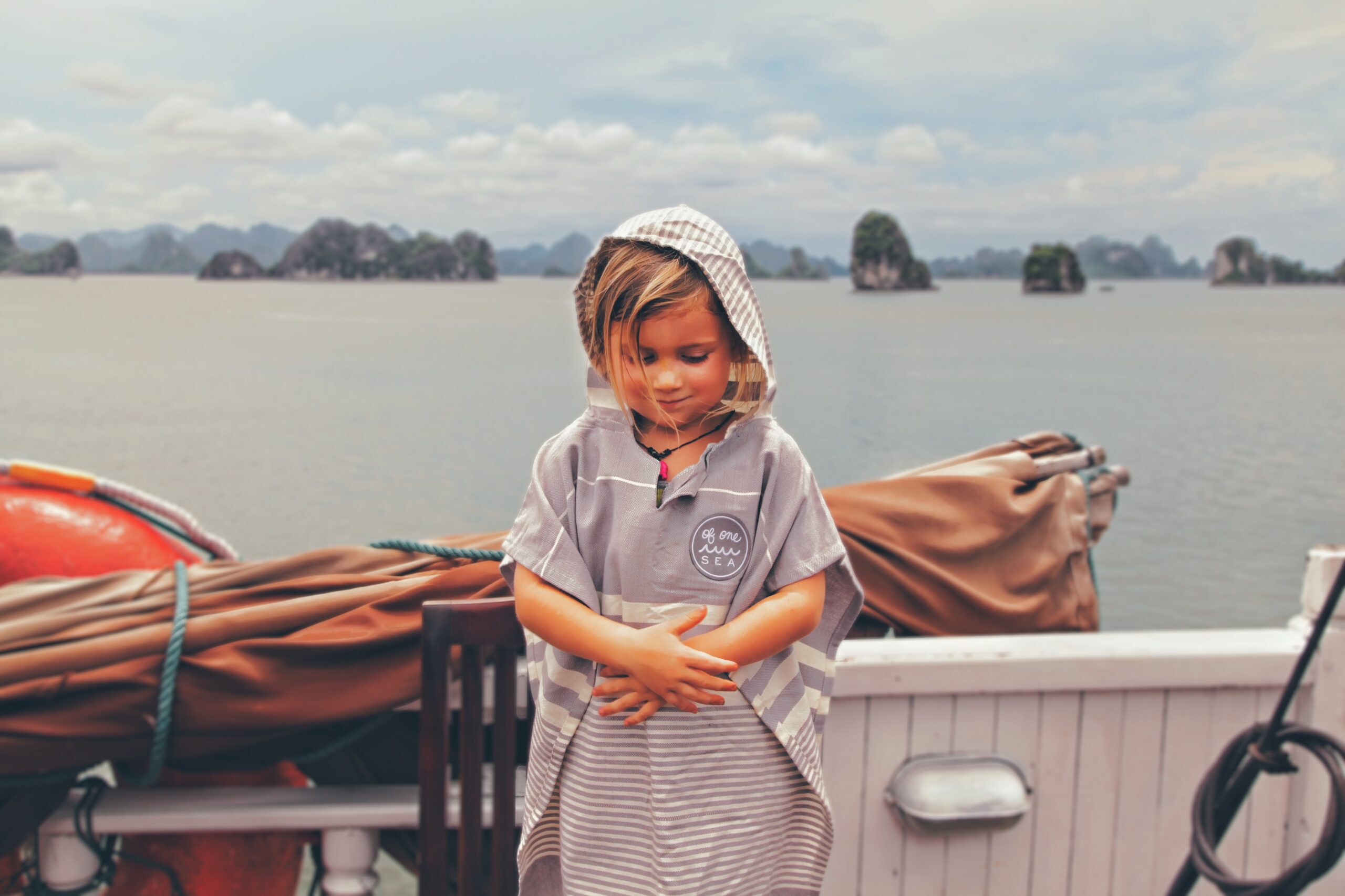 a child standing on a boat