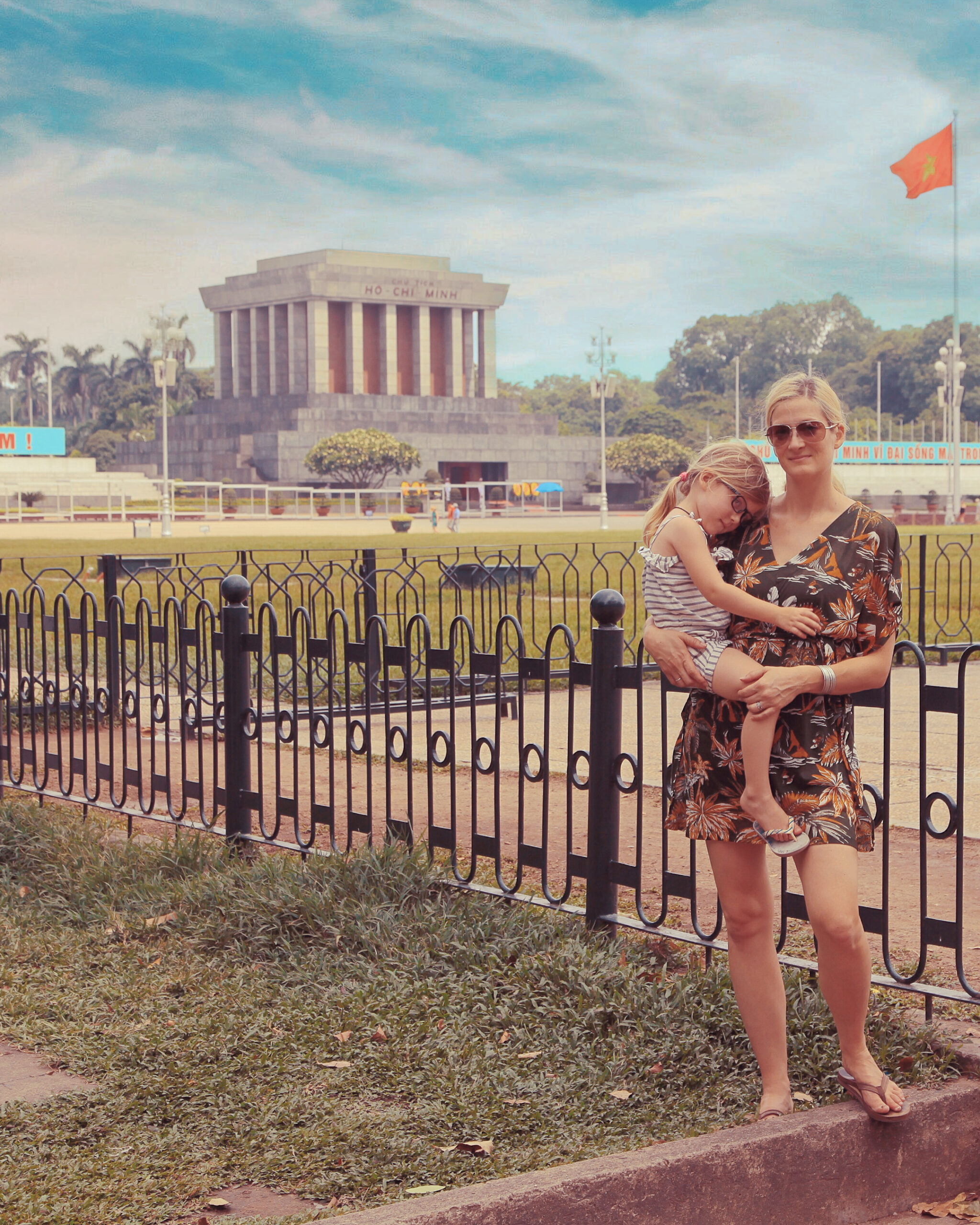 Woman with child at mausoleum.